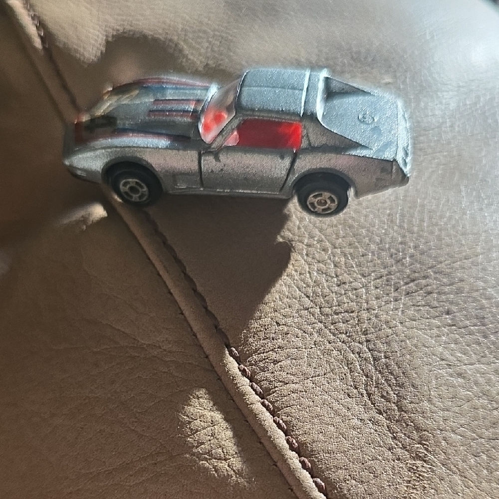 Silver and Red Toy Car